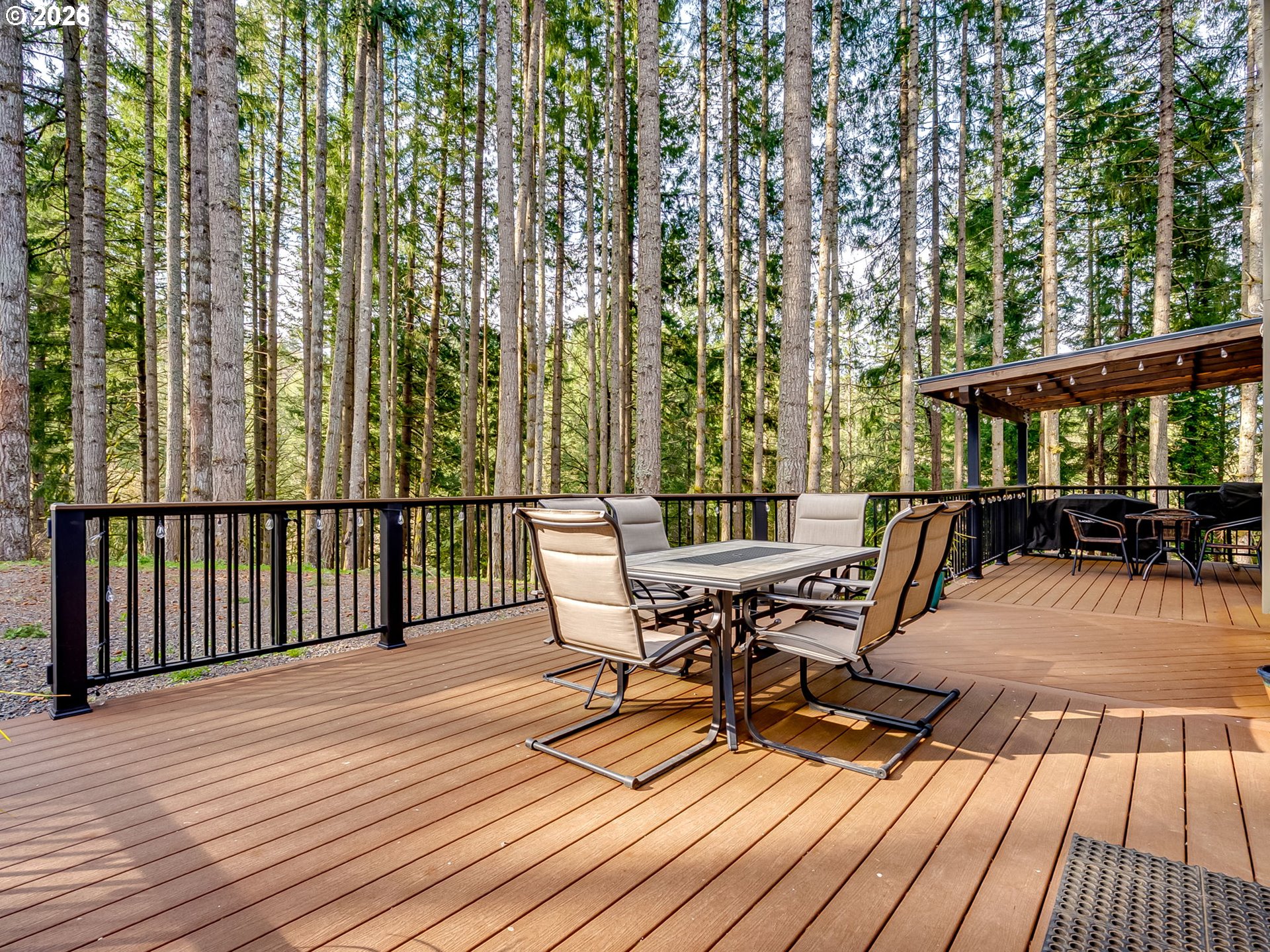 22967 South Day Hill Road Estacada, OR 97023 - Photo 6 of 40 a view of roof deck with patio and wooden floor