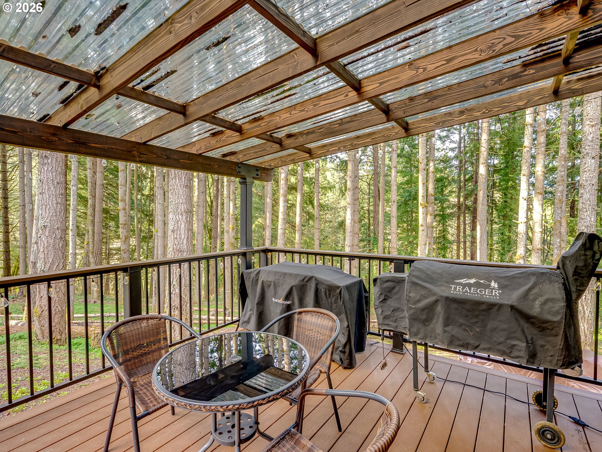 22967 South Day Hill Road Estacada, OR 97023 - Photo 8 of 40 a balcony with furniture and wooden floor