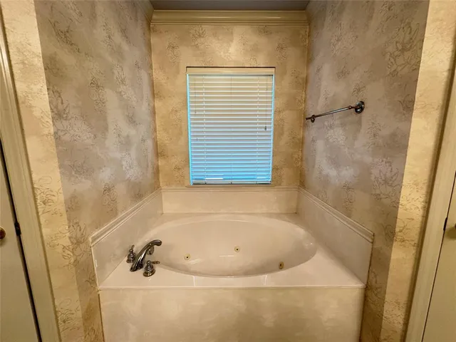 a bathroom with a bathtub