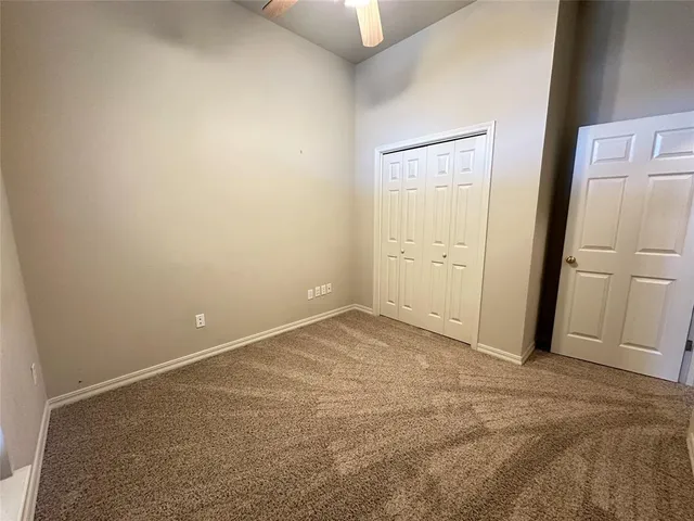 an empty room with closet
