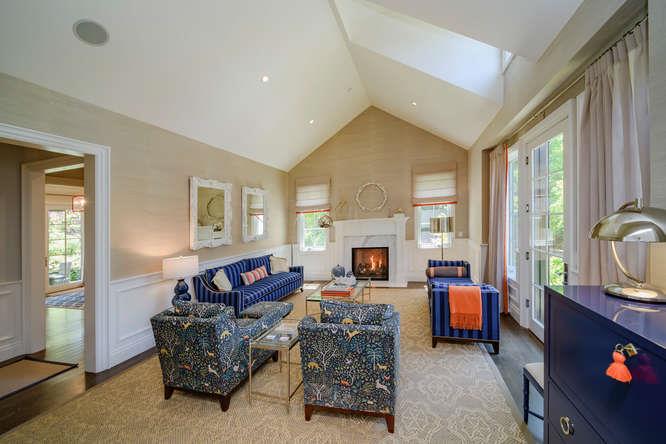 935 Chiltern Road Hillsborough, CA 94010 - Photo 3 of 36 a living room with furniture and a fireplace
