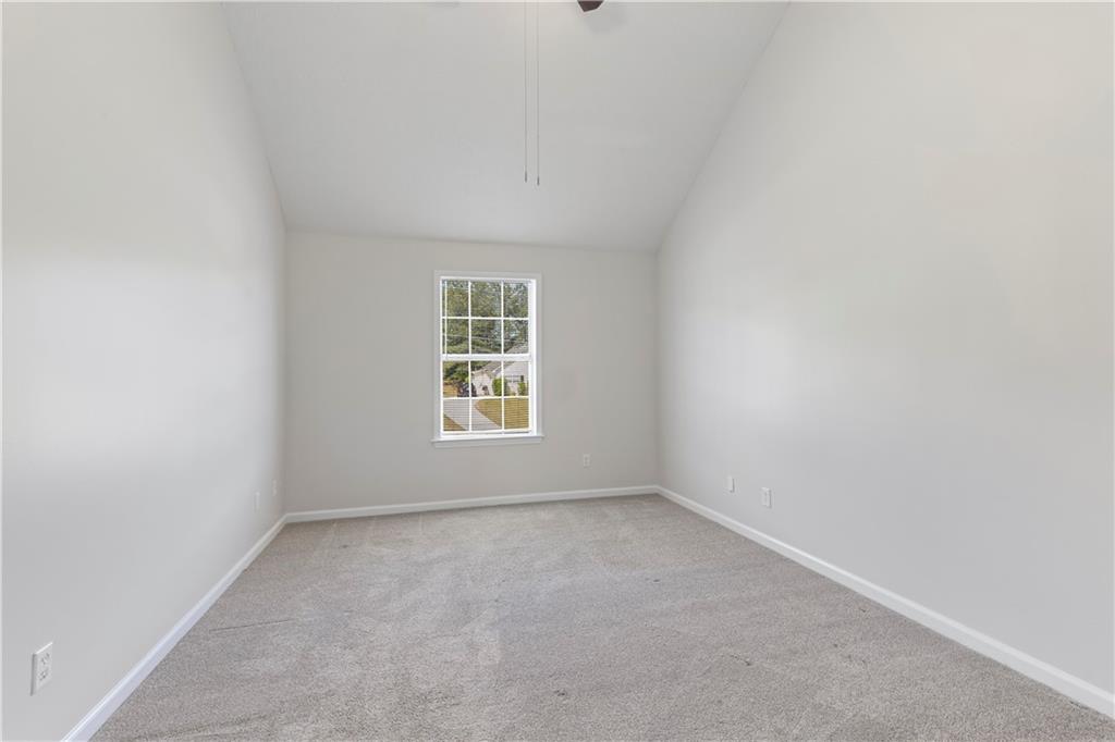 150 Fairclift Drive Covington, GA 30016 - Photo 12 of 22 an empty room with a window