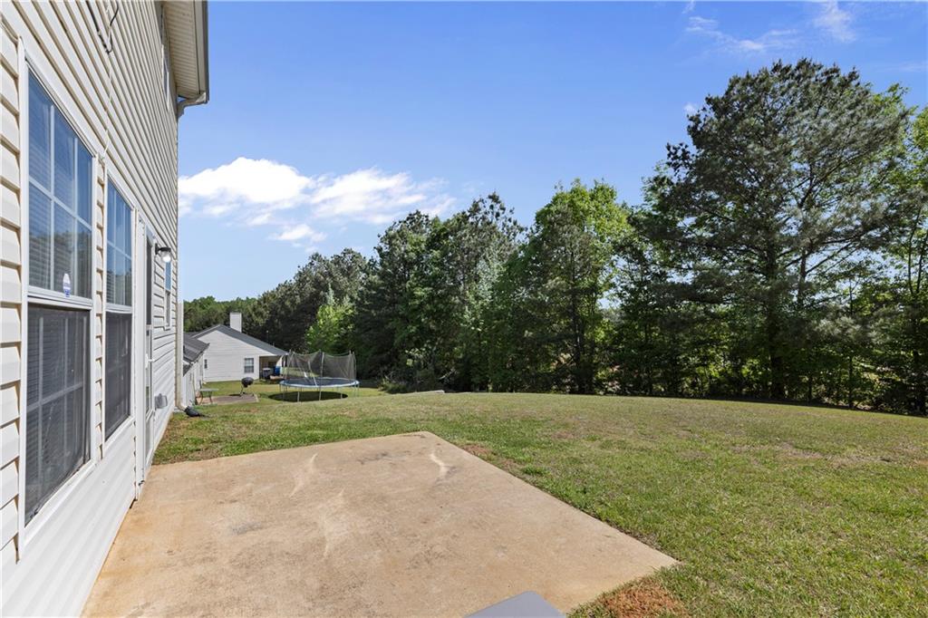 150 Fairclift Drive Covington, GA 30016 - Photo 20 of 22 a view of a back yard