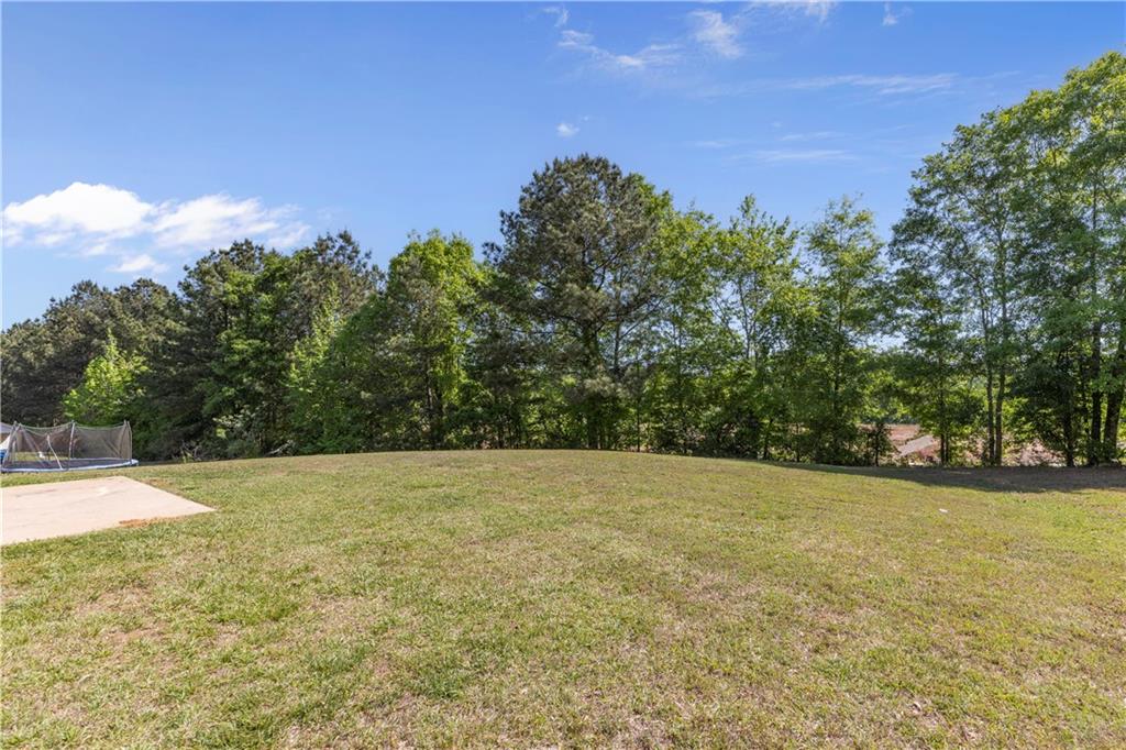 150 Fairclift Drive Covington, GA 30016 - Photo 21 of 22 a view of an outdoor space and a yard