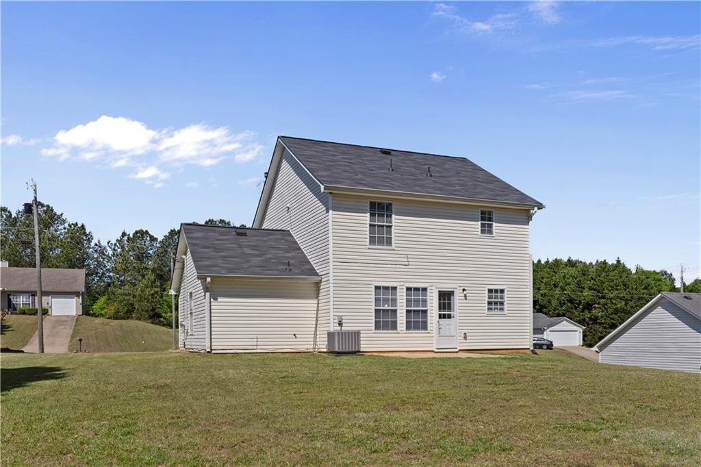 150 Fairclift Drive Covington, GA 30016 - Photo 22 of 22 a view of a house with a yard