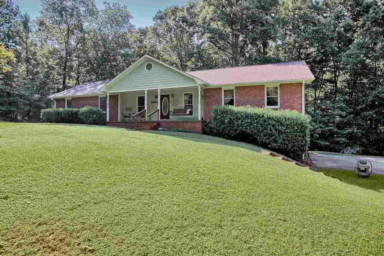 583 Rock Road Stockbridge, GA 30281 - Photo 1 of 1 a front view of a house with garden