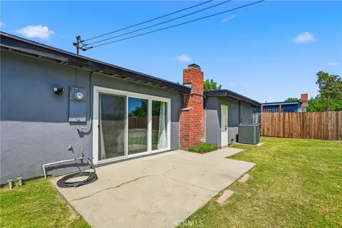 a house view with a backyard space