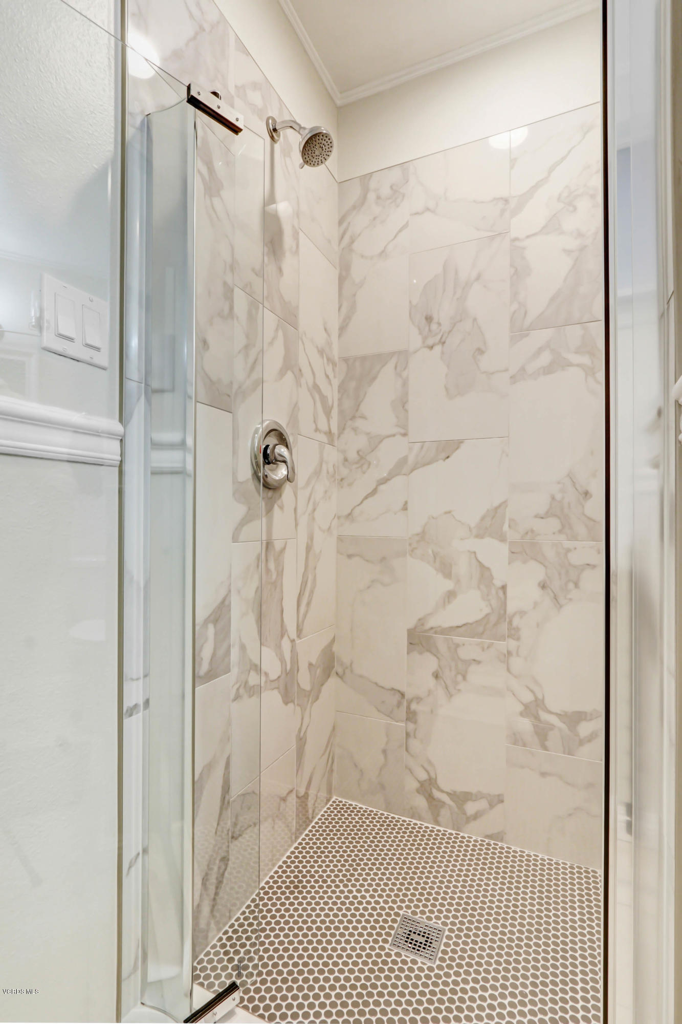 6205 Melia Street Simi Valley, CA 93063 - Photo 26 of 36 a bathroom with a shower