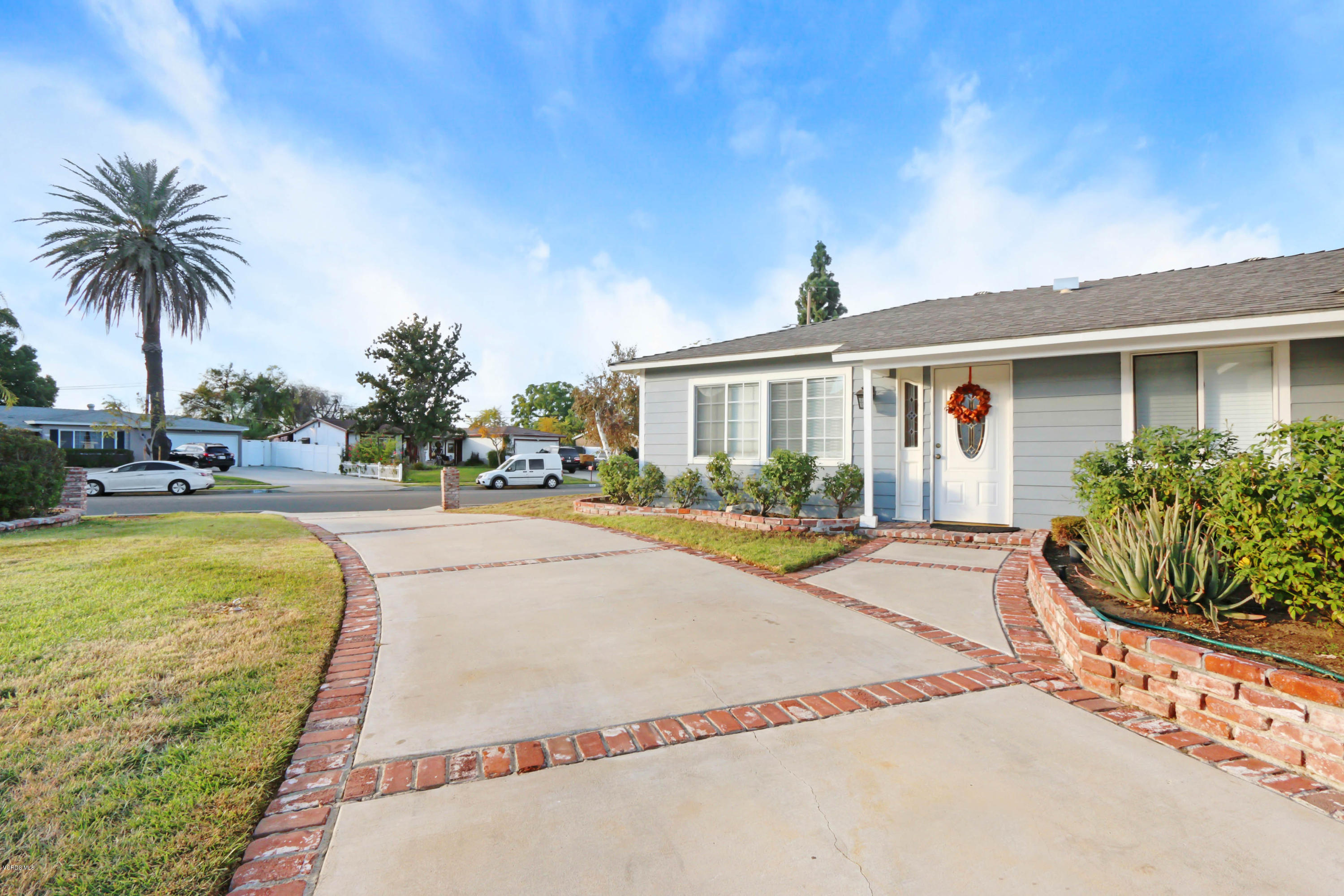 6205 Melia Street Simi Valley, CA 93063 - Photo 4 of 36 a swimming pool with outdoor seating and yard