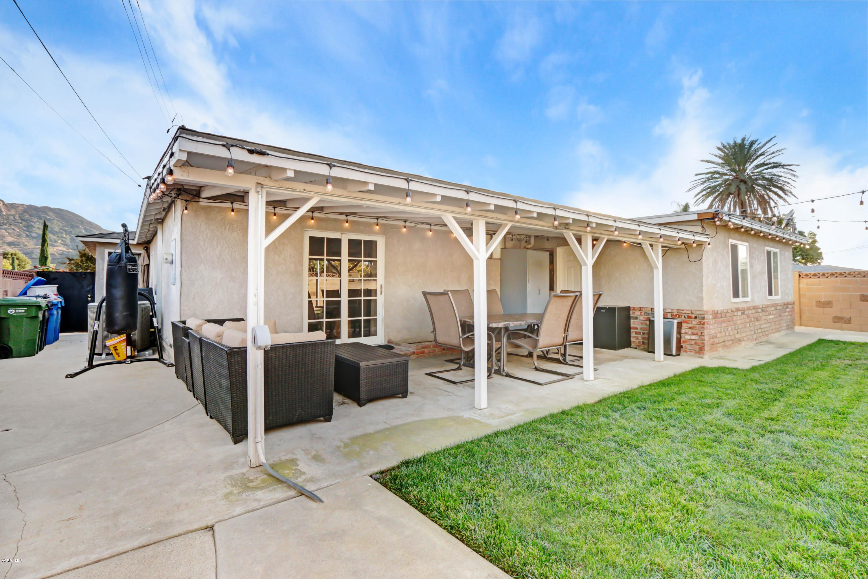 6205 Melia Street Simi Valley, CA 93063 - Photo 34 of 36 front view of a house with a patio