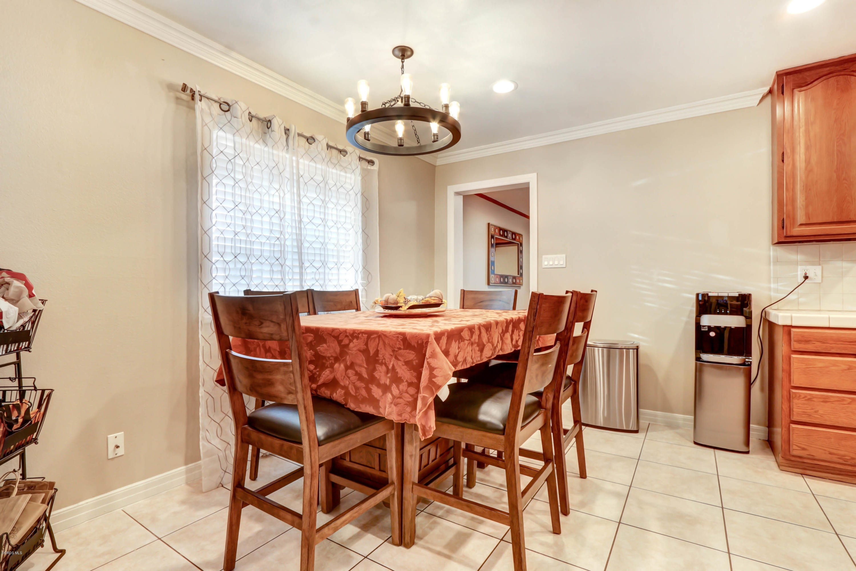 6205 Melia Street Simi Valley, CA 93063 - Photo 9 of 36 a dining room with furniture and window