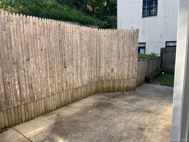 92 Harbor Road Port Washington, NY 11050 - Photo 11 of 15 Patio through sliding glass door from kitchen