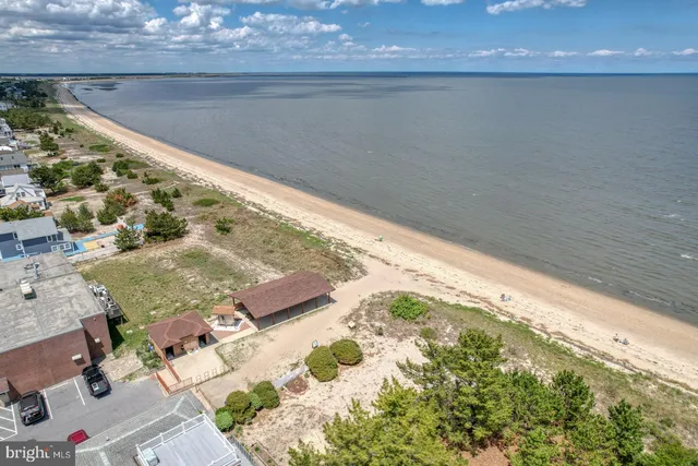 a view of a lake with a yard