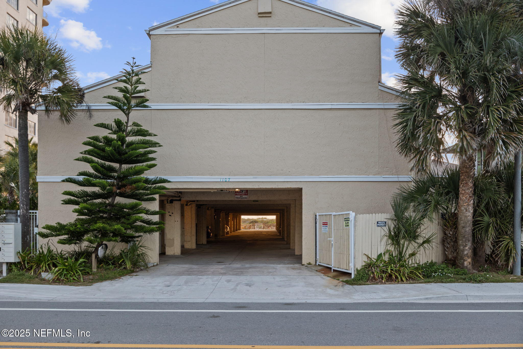 1107 1st Street South, Unit B Jacksonville Beach, FL 32250 - Photo 30 of 45 a view of a house with a yard and garage