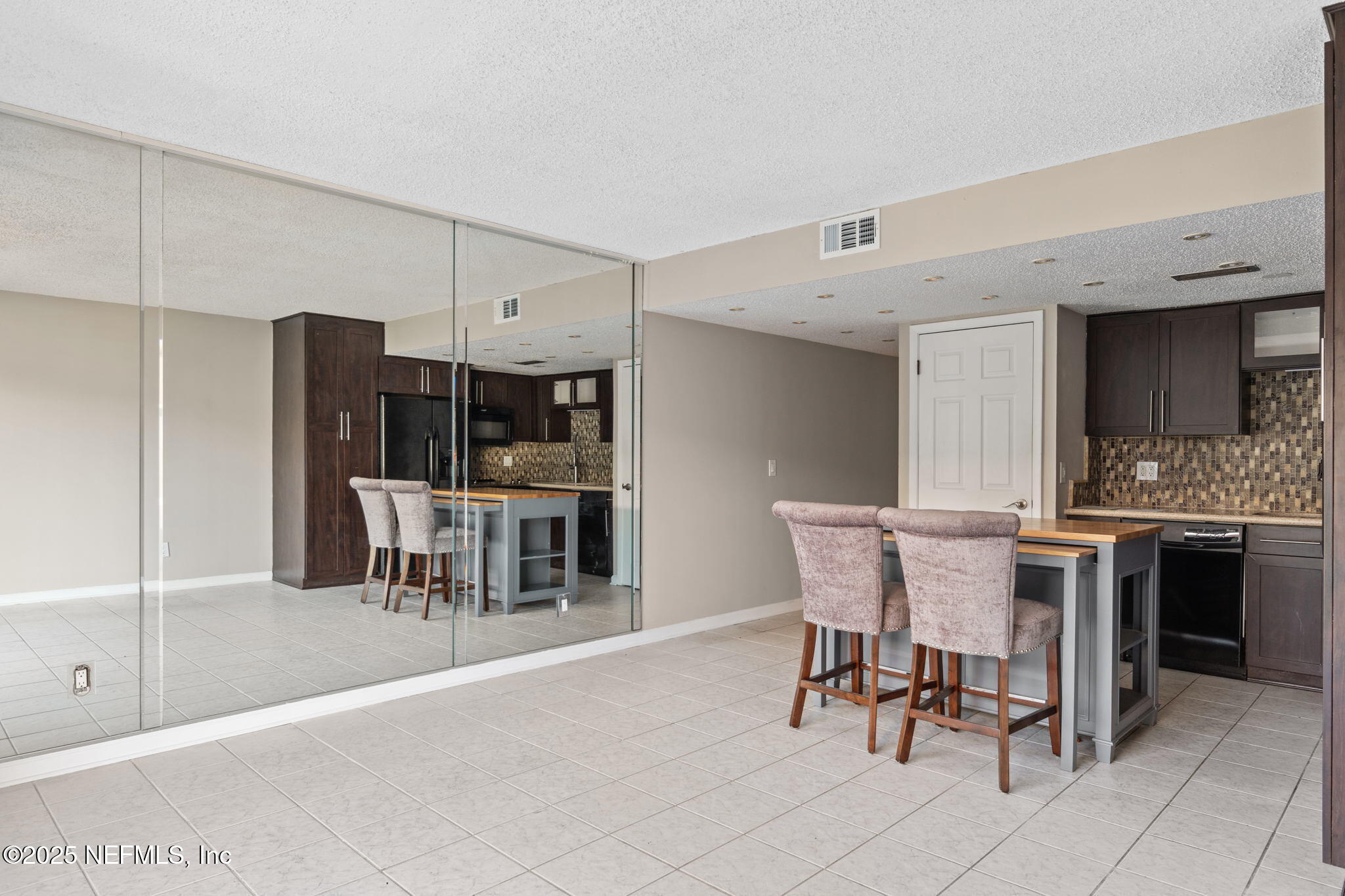 1107 1st Street South, Unit B Jacksonville Beach, FL 32250 - Photo 33 of 45 a view of a dining room with furniture