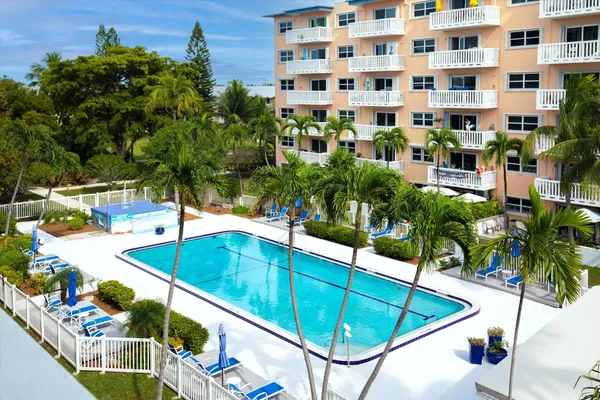 a view of a swimming pool with a patio