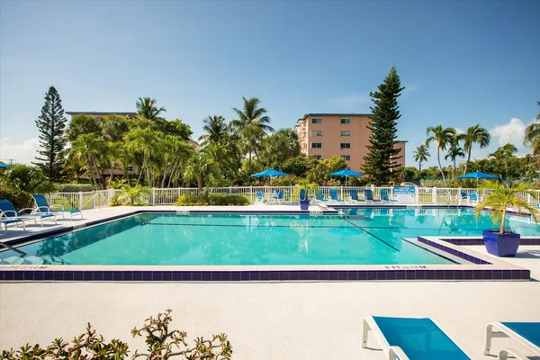 a view of swimming pool with a yard