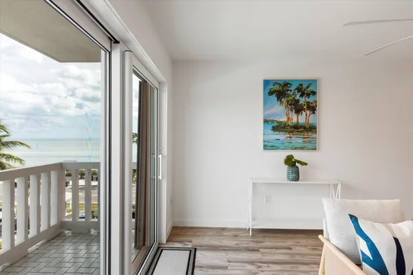a view of an entryway and kitchen view