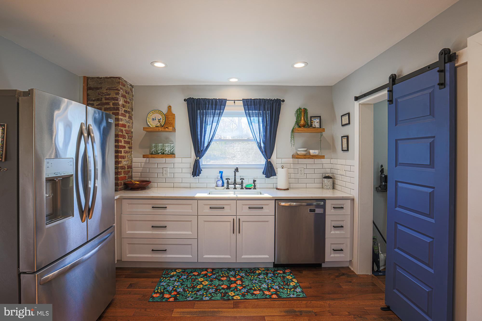 402 Philadelphia Road Joppa, MD 21085 - Photo 17 of 68 Kitchen & Barn Door to Pantry
