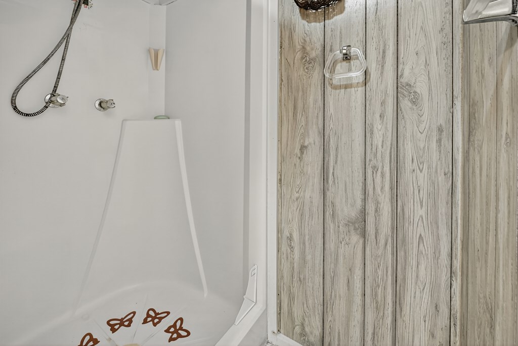 654 Stover Knob Trail Cherry Log, GA 30522 - Photo 24 of 44 a bathroom with a shower