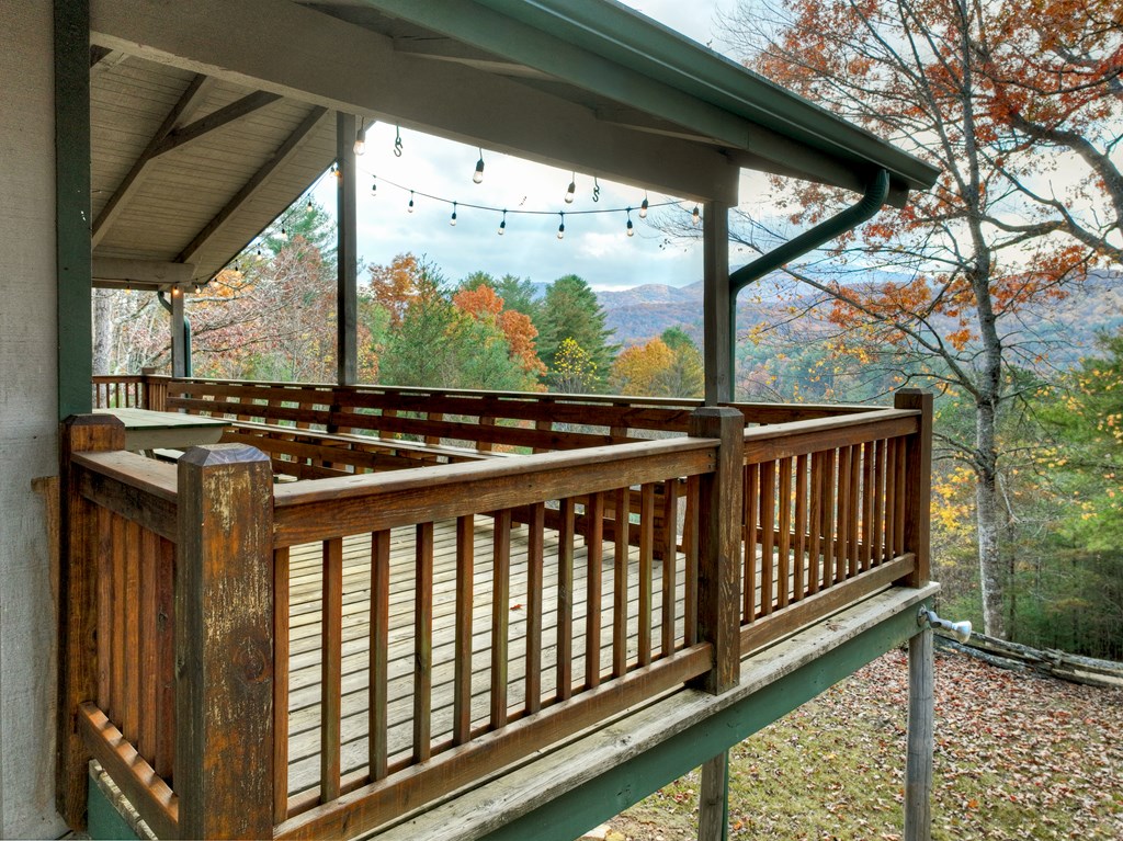 654 Stover Knob Trail Cherry Log, GA 30522 - Photo 26 of 44 a view of a porch with wooden floor