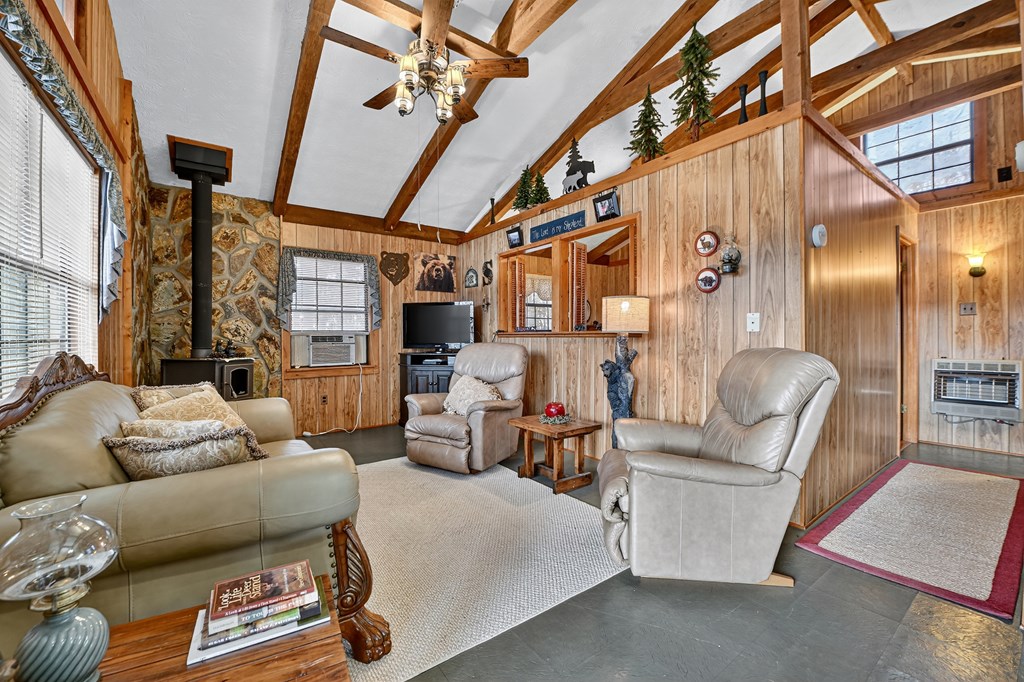 654 Stover Knob Trail Cherry Log, GA 30522 - Photo 4 of 44 a living room with furniture and a chandelier