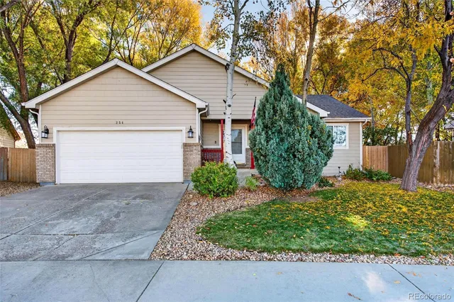 front view of house with a yard