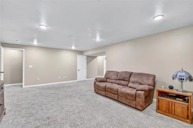 a living room with furniture and a couch