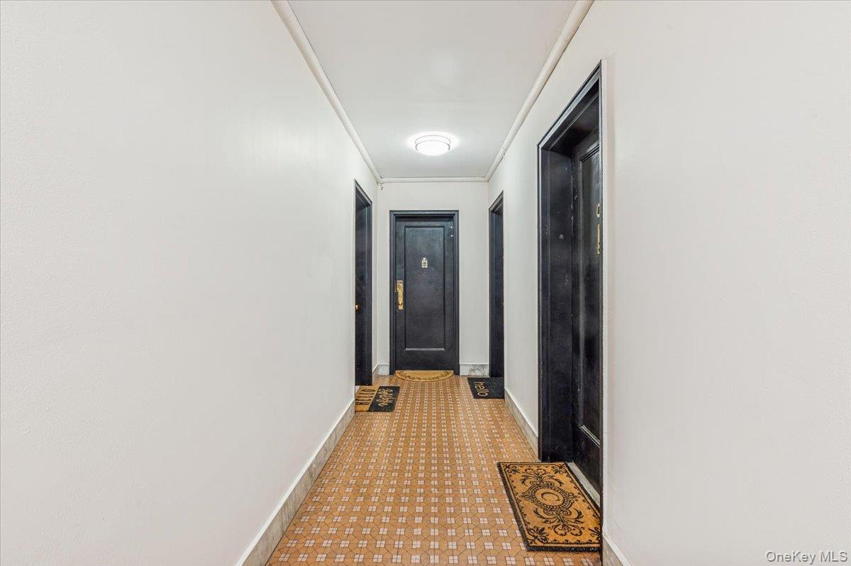 600 Pelham Road, Unit A2D New Rochelle, NY 10805 - Photo 4 of 19 Hallway featuring baseboards and light floors