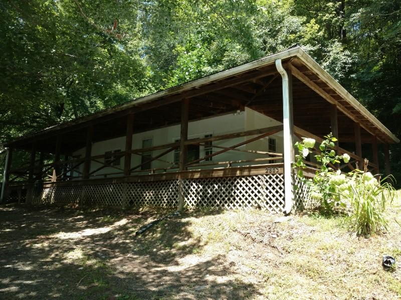 2863 Conner Grove Road Southwest Willis, VA 24380 - Photo 2 of 13 a front view of a house with a yard
