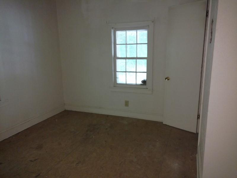 2863 Conner Grove Road Southwest Willis, VA 24380 - Photo 7 of 13 an empty room with a window