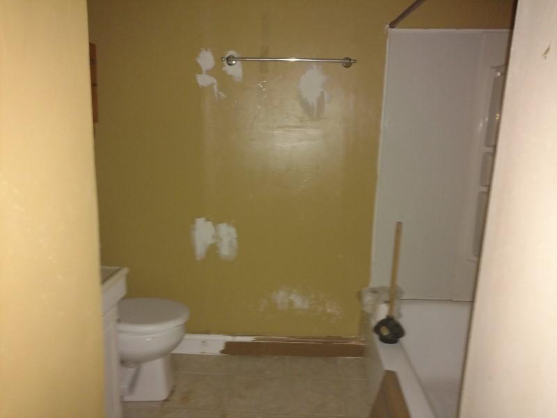 2863 Conner Grove Road Southwest Willis, VA 24380 - Photo 8 of 13 a bathroom with a white toilet and a shower