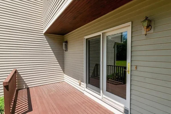 a view of a door and a window