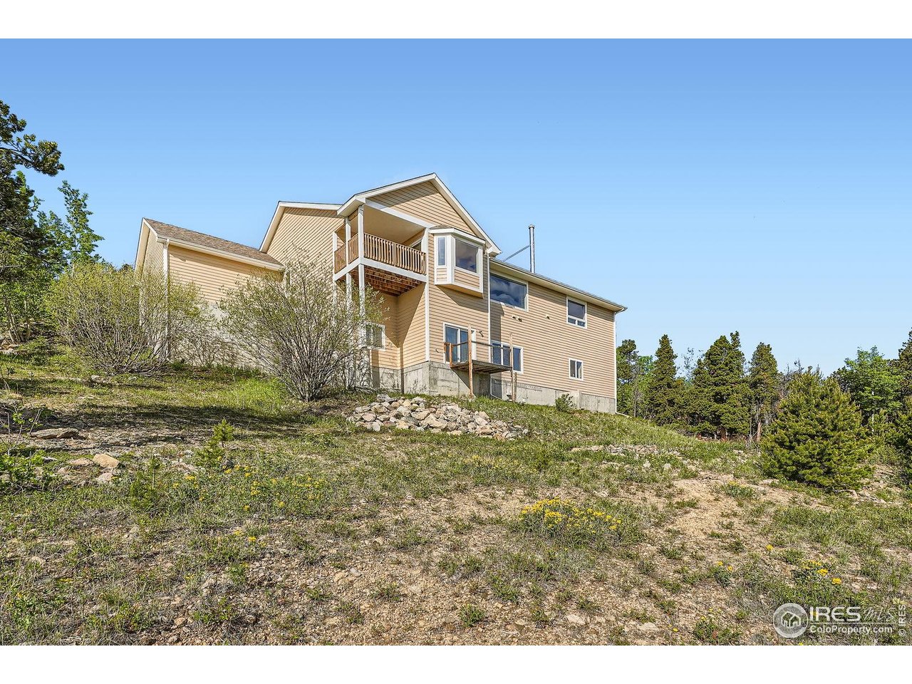 557 Highpoint Circle Black Hawk, CO 80422 - Photo 25 of 32 a house view with a outdoor space
