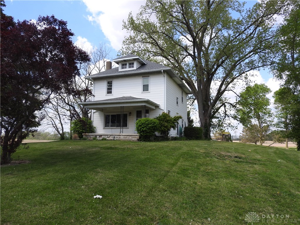 2105 East Loy Road Piqua, OH 45356 - Photo 2 of 26 This charming home features a classic exterior and a spacious yard.