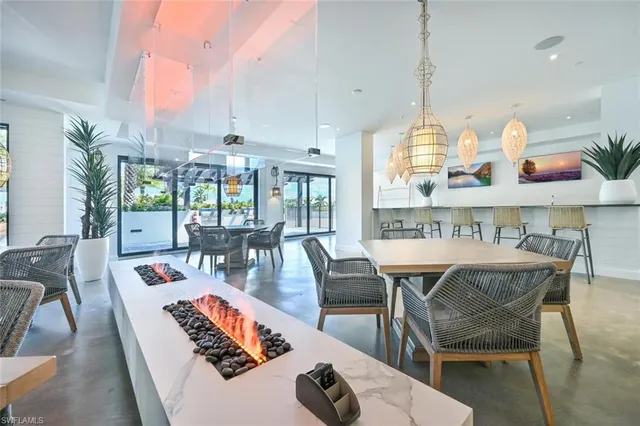a dining room with furniture window wooden floor