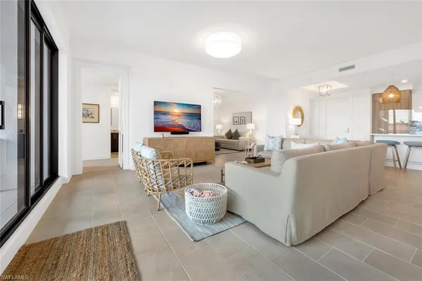 a living room with a couch and a table