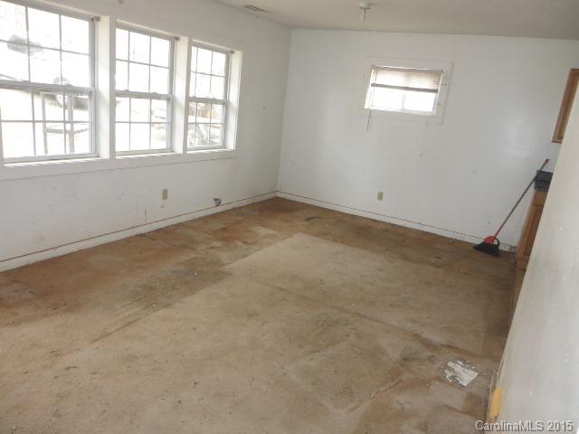 3911 Robinson Road Newton, NC 28658 - Photo 2 of 12 an empty room with a window