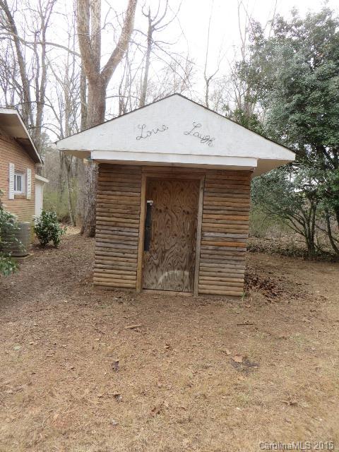 3911 Robinson Road Newton, NC 28658 - Photo 11 of 12 a view of a house with a yard