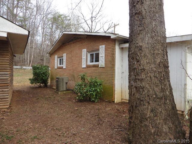 3911 Robinson Road Newton, NC 28658 - Photo 12 of 12 a house with trees in front of it