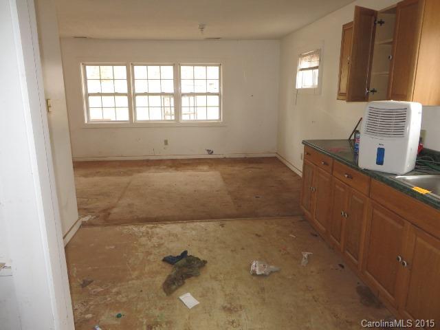 3911 Robinson Road Newton, NC 28658 - Photo 4 of 12 an empty room with a window