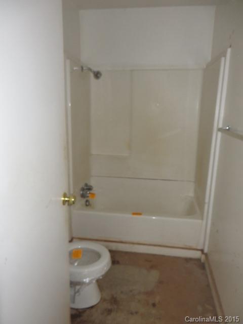 3911 Robinson Road Newton, NC 28658 - Photo 5 of 12 a bathroom with a toilet and a shower