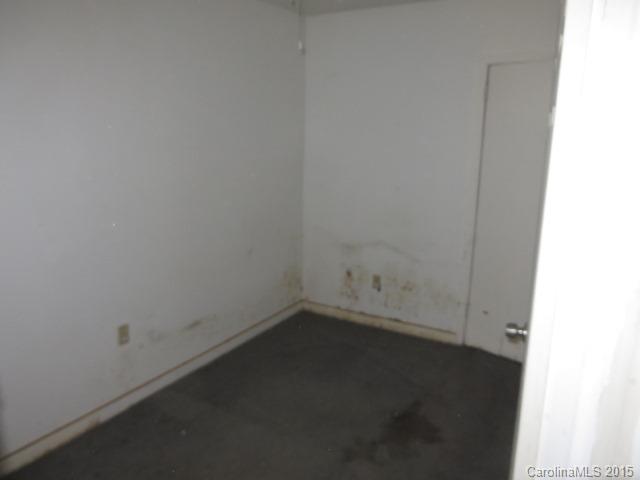 3911 Robinson Road Newton, NC 28658 - Photo 6 of 12 an empty room with a empty space
