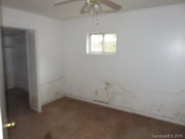 3911 Robinson Road Newton, NC 28658 - Photo 8 of 12 an empty room with a window
