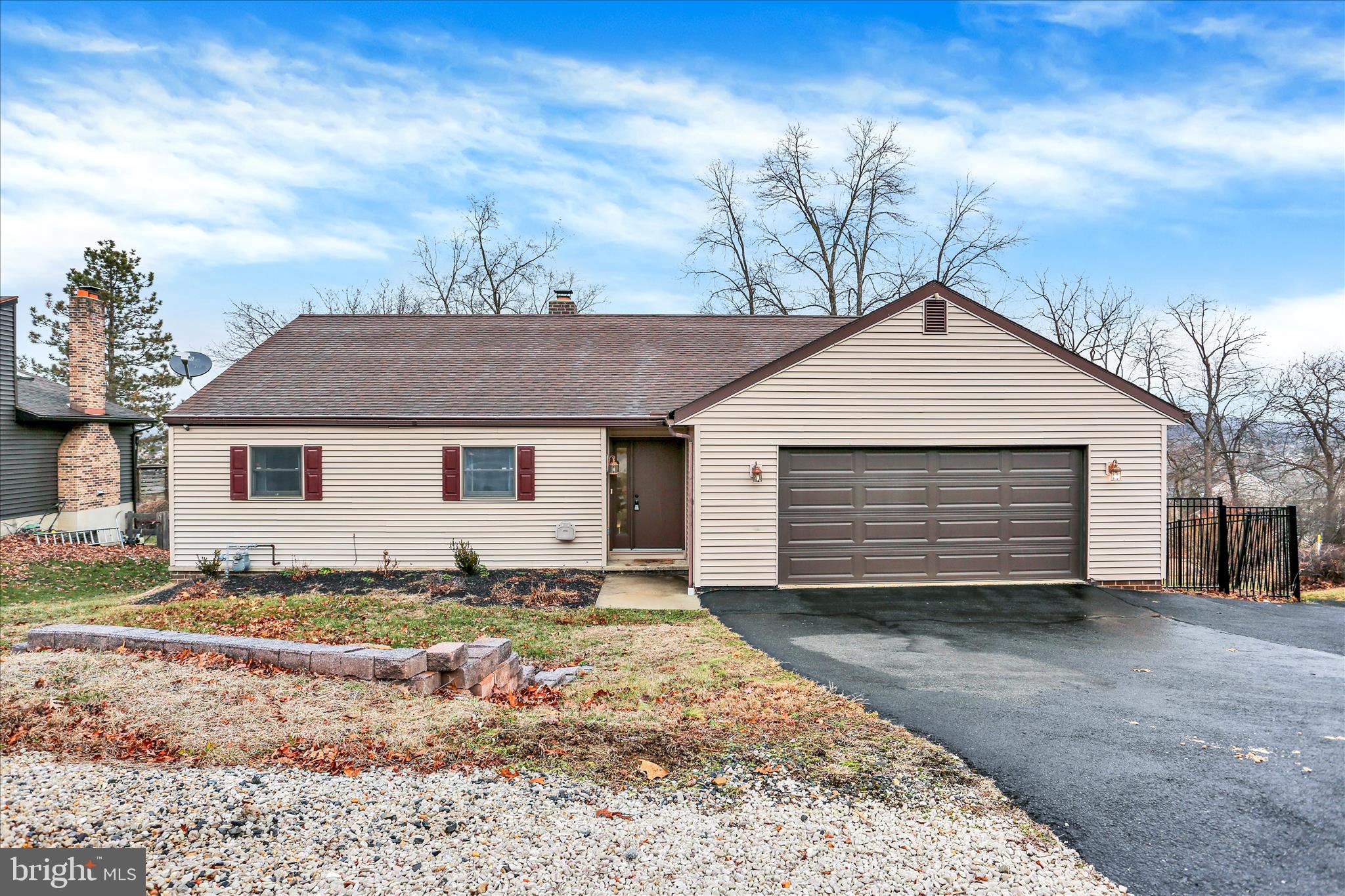 203 Pembroke Drive Shillington, PA 19607 - Photo 1 of 41 a front view of a house with a yard