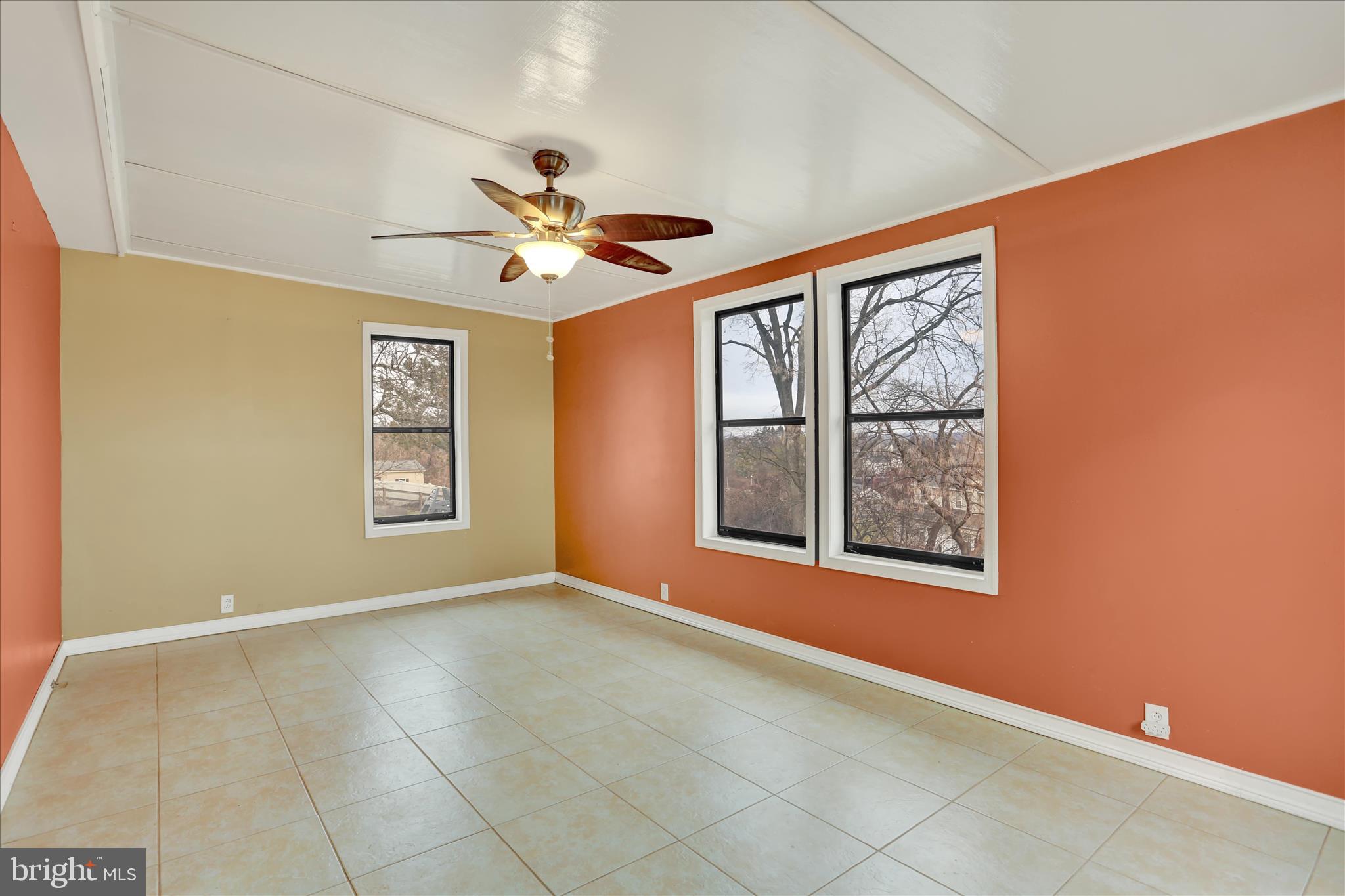 203 Pembroke Drive Shillington, PA 19607 - Photo 13 of 41 an empty room with windows and fan