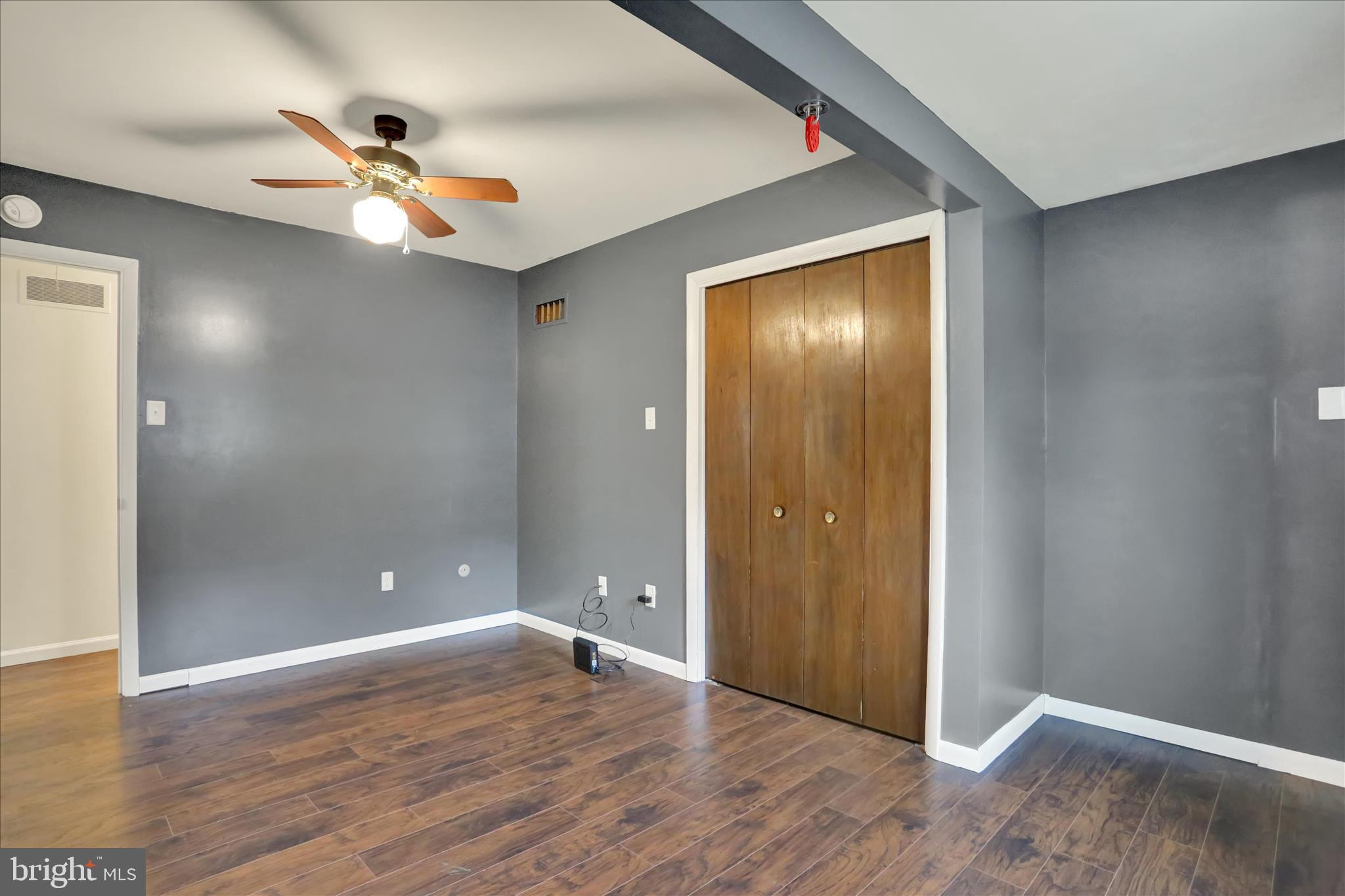 203 Pembroke Drive Shillington, PA 19607 - Photo 16 of 41 a view of an empty room with wooden floor