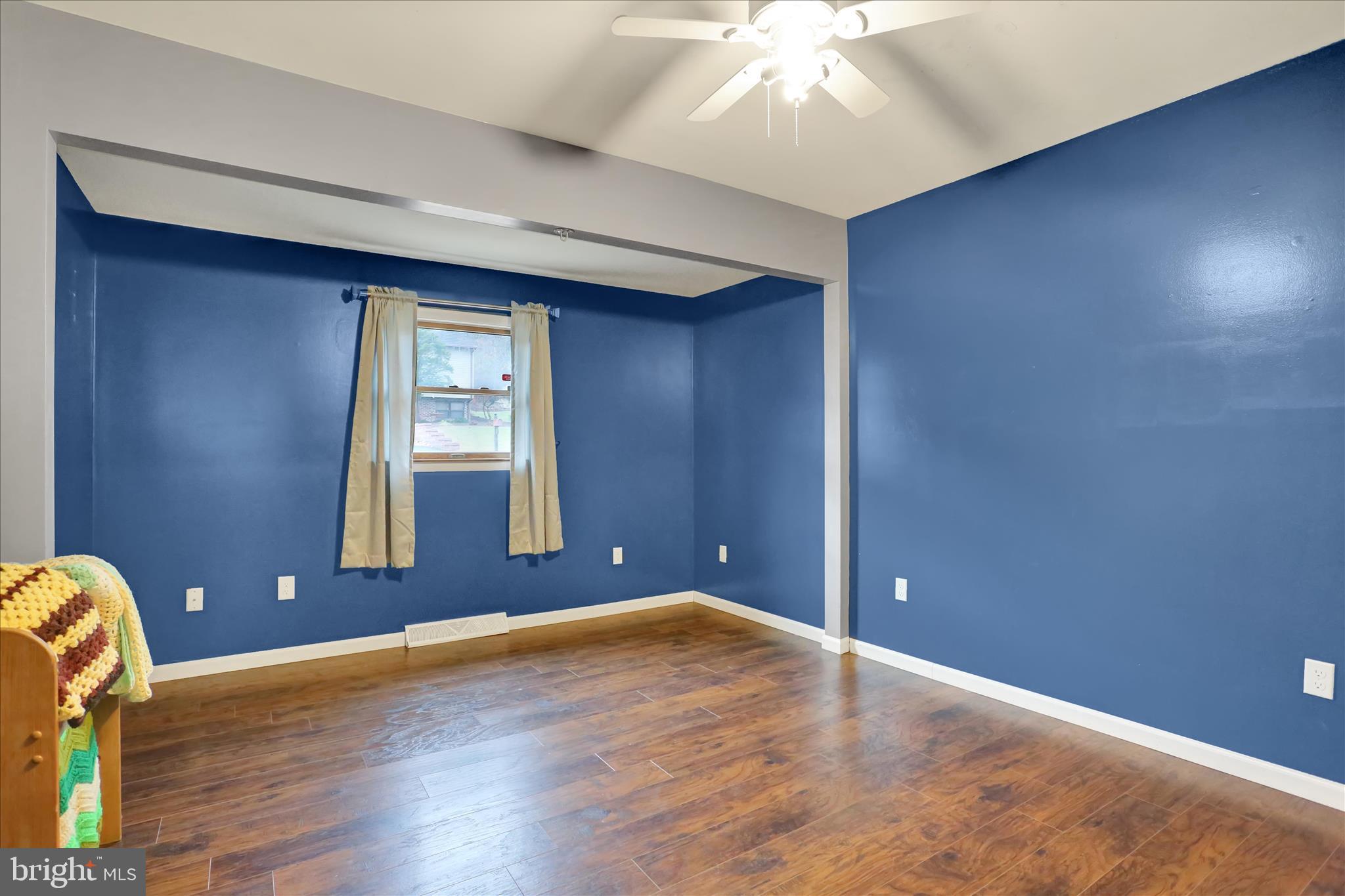 203 Pembroke Drive Shillington, PA 19607 - Photo 17 of 41 an empty room with wooden floor and windows