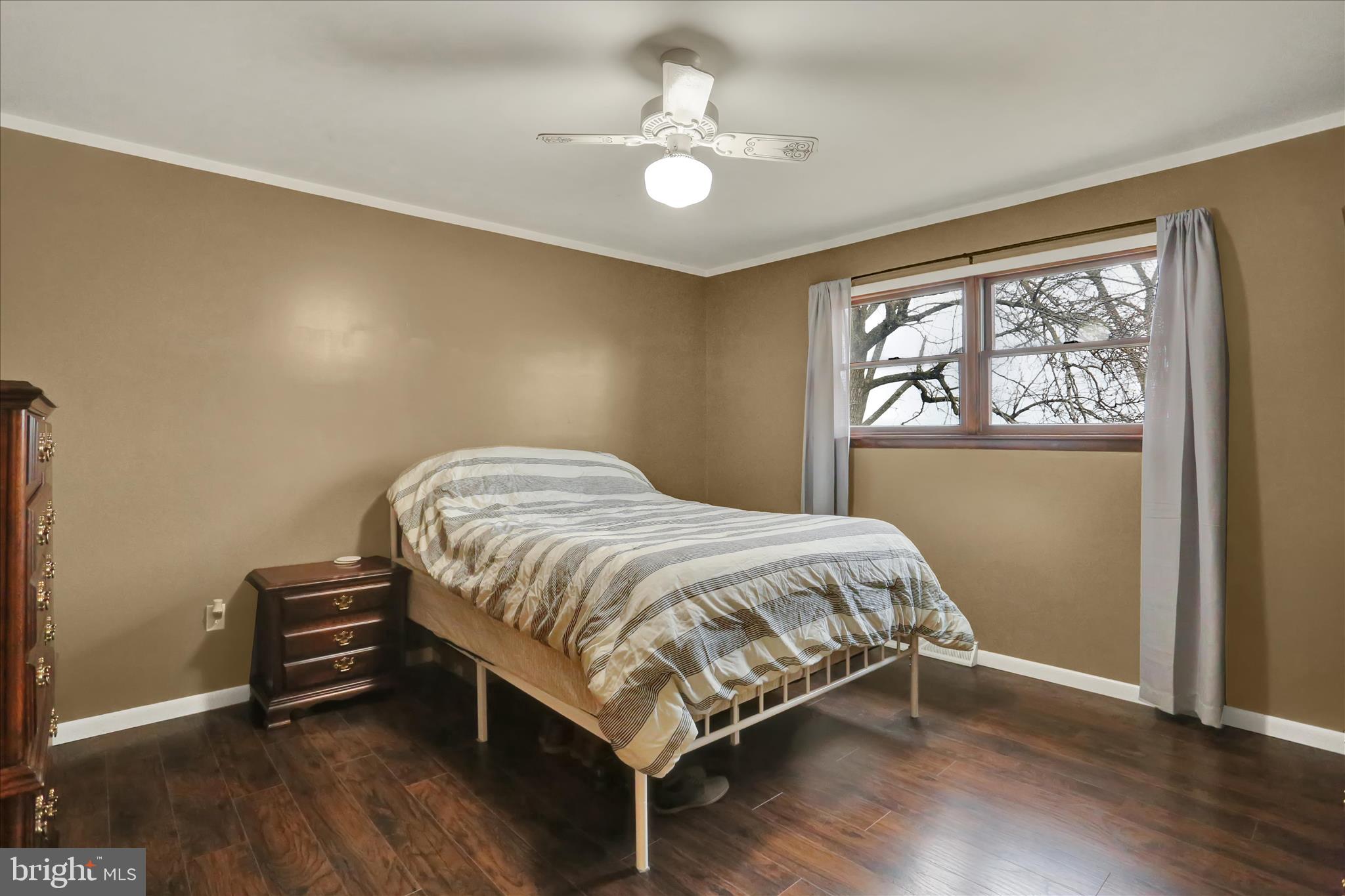 203 Pembroke Drive Shillington, PA 19607 - Photo 21 of 41 a bed sitting in a spacious bedroom next to a window