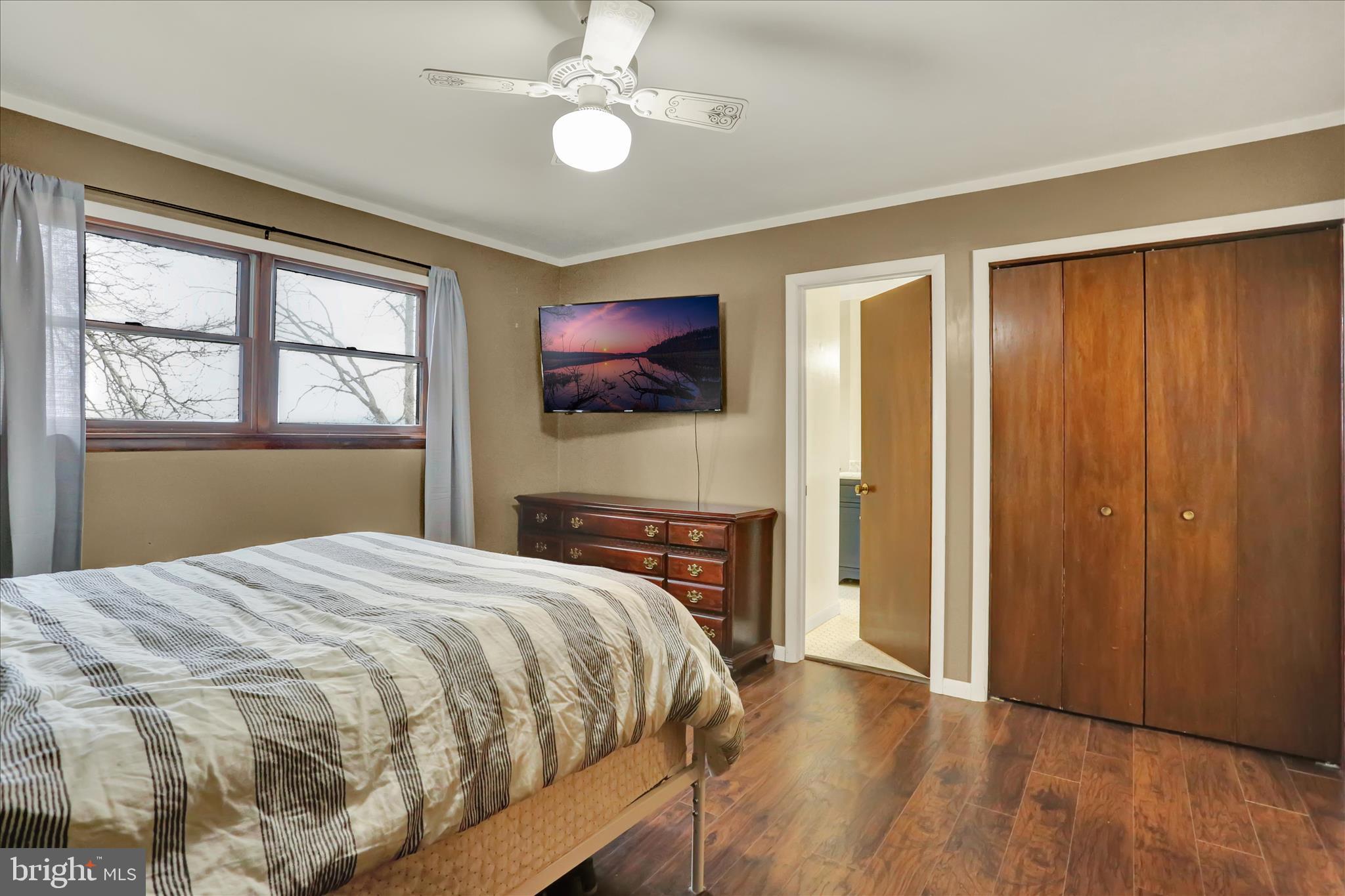 203 Pembroke Drive Shillington, PA 19607 - Photo 22 of 41 a bedroom with a bed and wooden floor